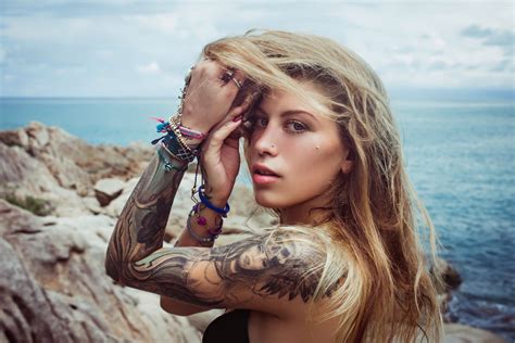 bikini area tattoo|swimsuits that show off tattoos.